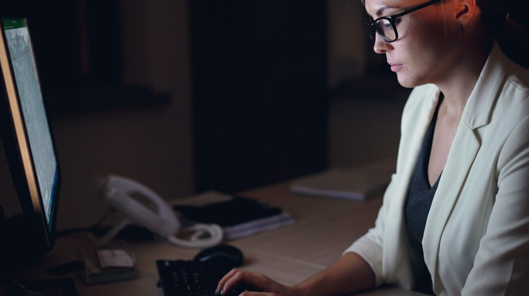 woman detective at desk