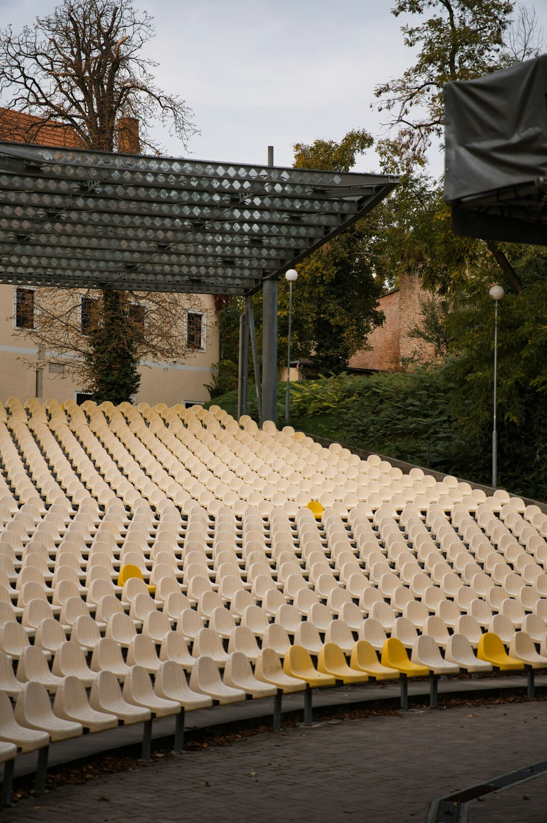 Empty rows of cinema seats in soft light
