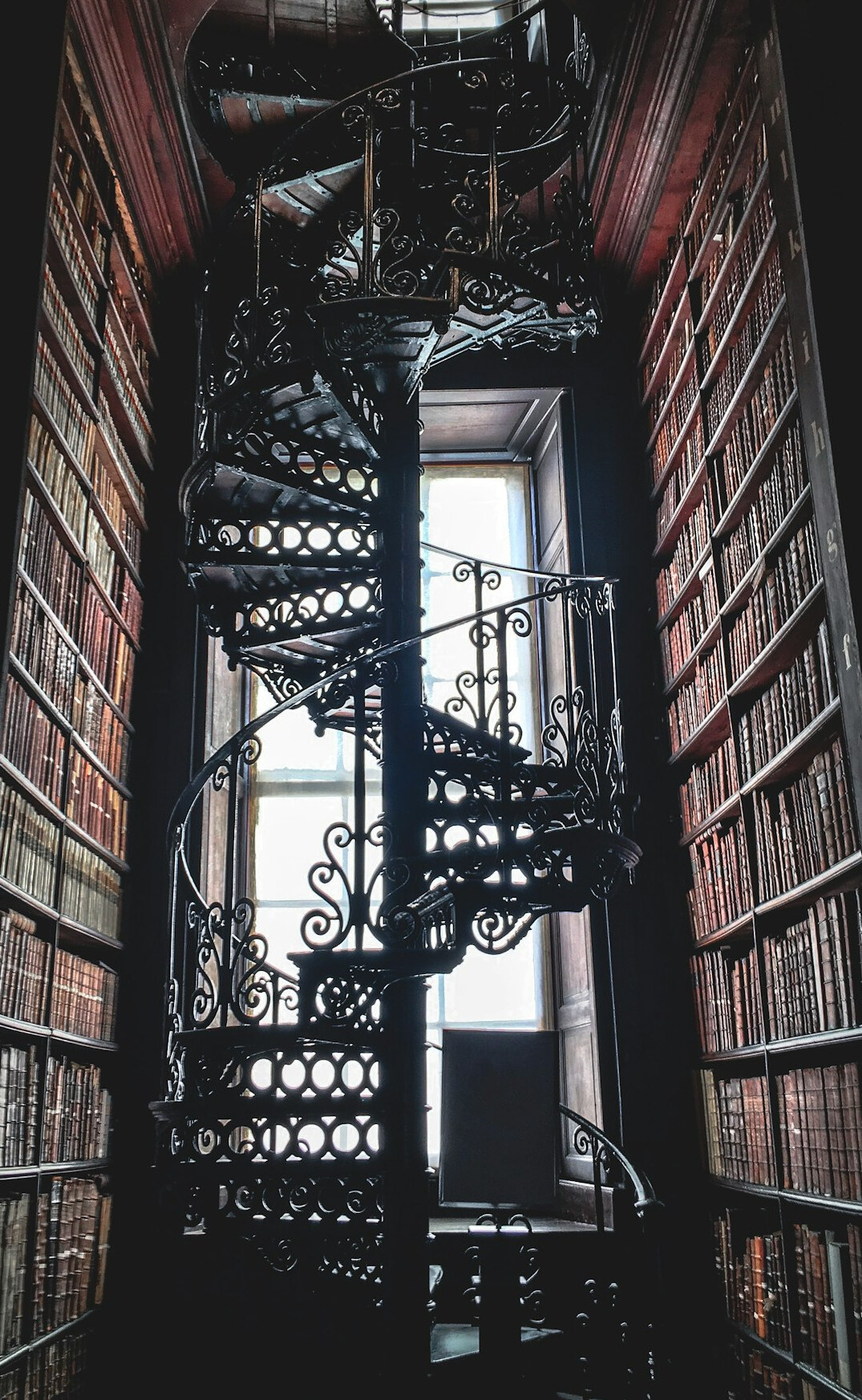Grand old library with a spiral of bookshelves